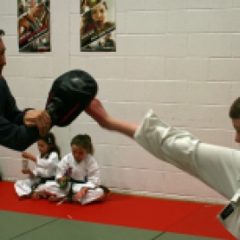 Finn Kicking Tom
